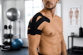 Athlete with Veyon tape applied to shoulder